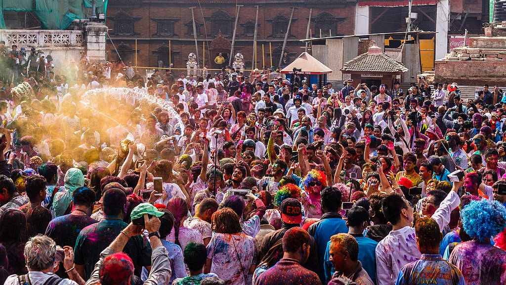 People celebrating Holi at Basantapur Durbar Square, Kathmandu